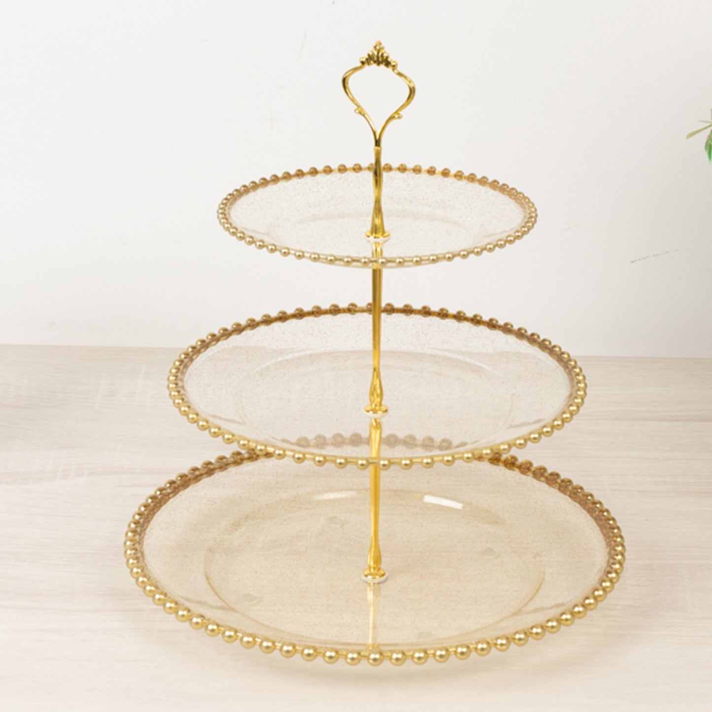 14" clear gold glittered 3-tier dessert display stand with beaded rim.