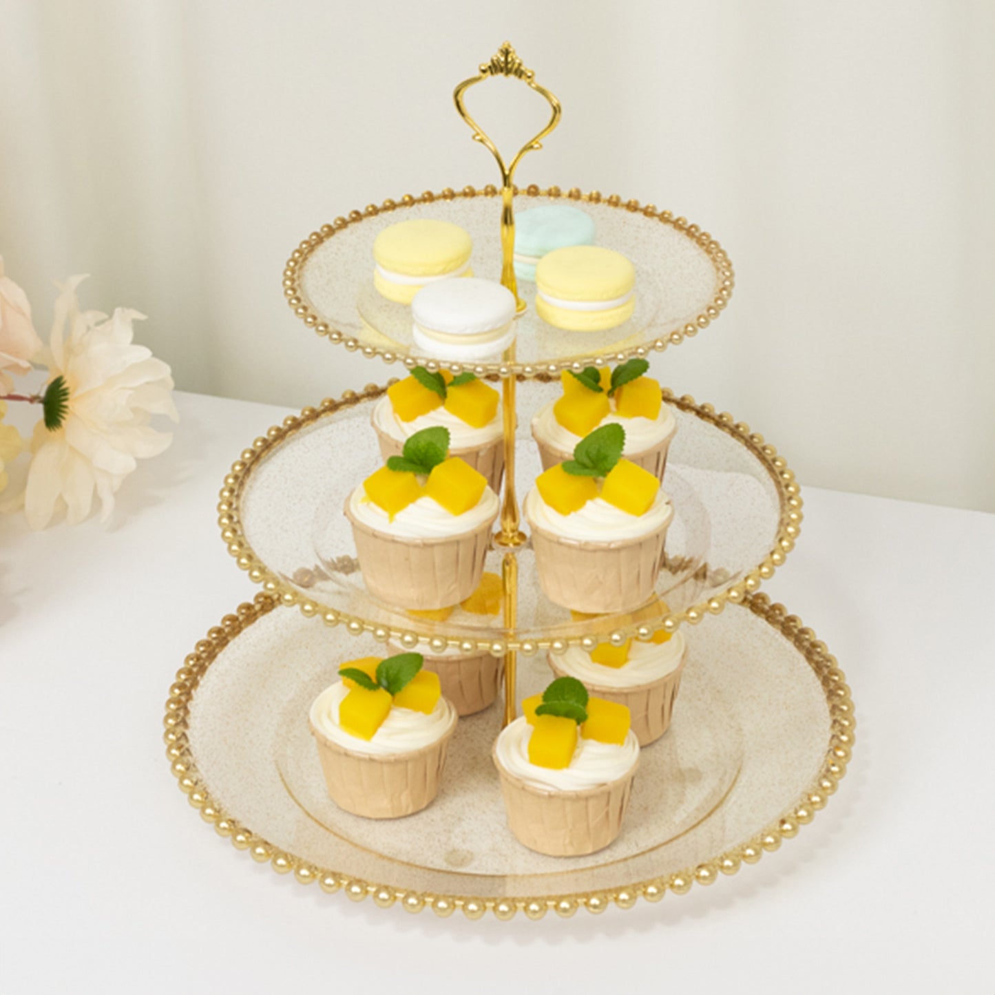 Clear gold glittered 3-tier dessert stand with gold beaded rim.