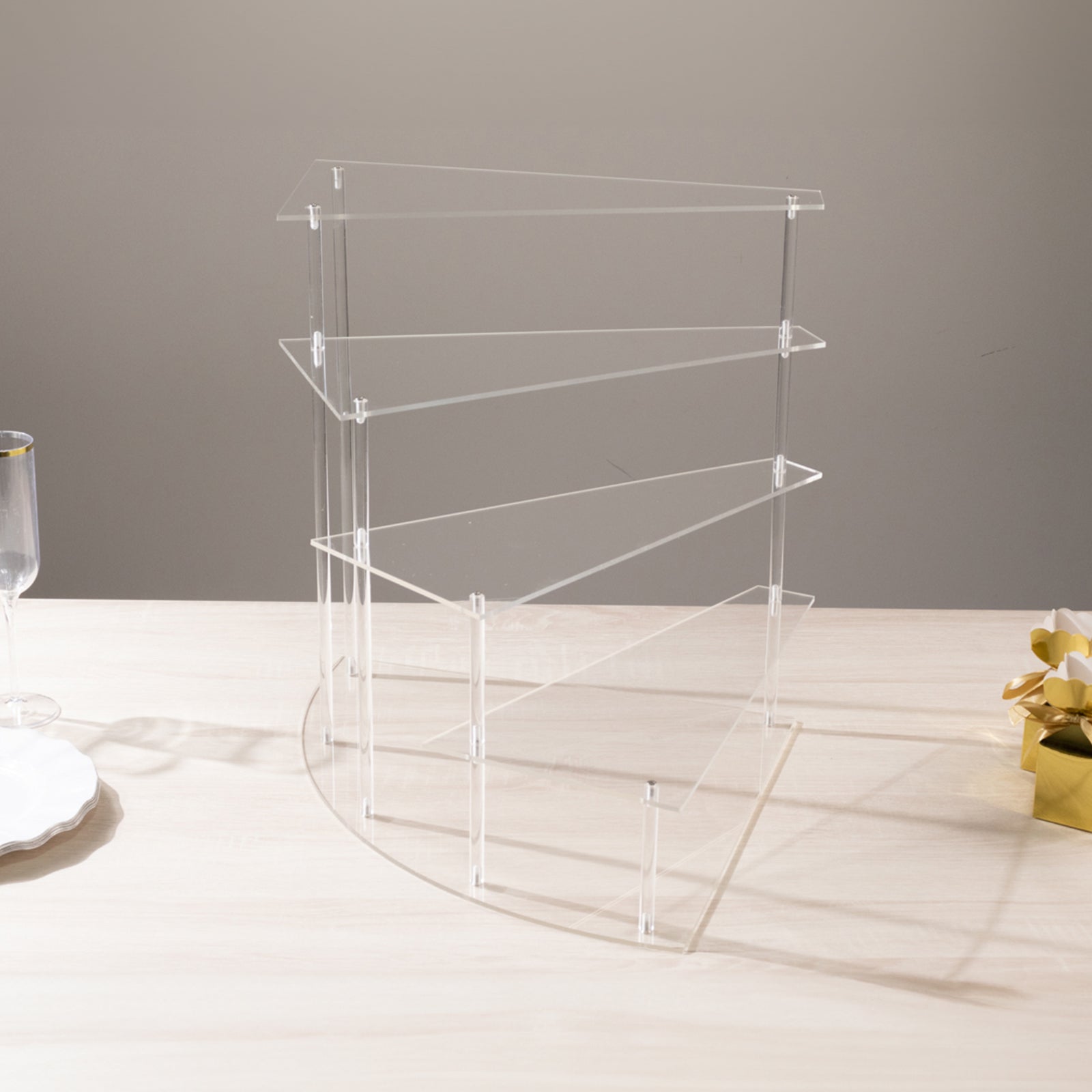 Clear acrylic 4-tier cupcake stand for desserts and perfumes, 17" tall.