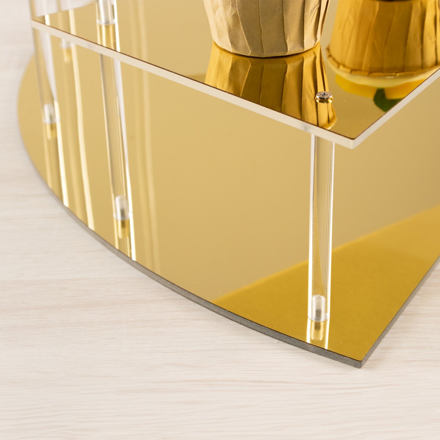 Gold spiral cupcake stand with mirror finish, 4 tiers for dessert display.