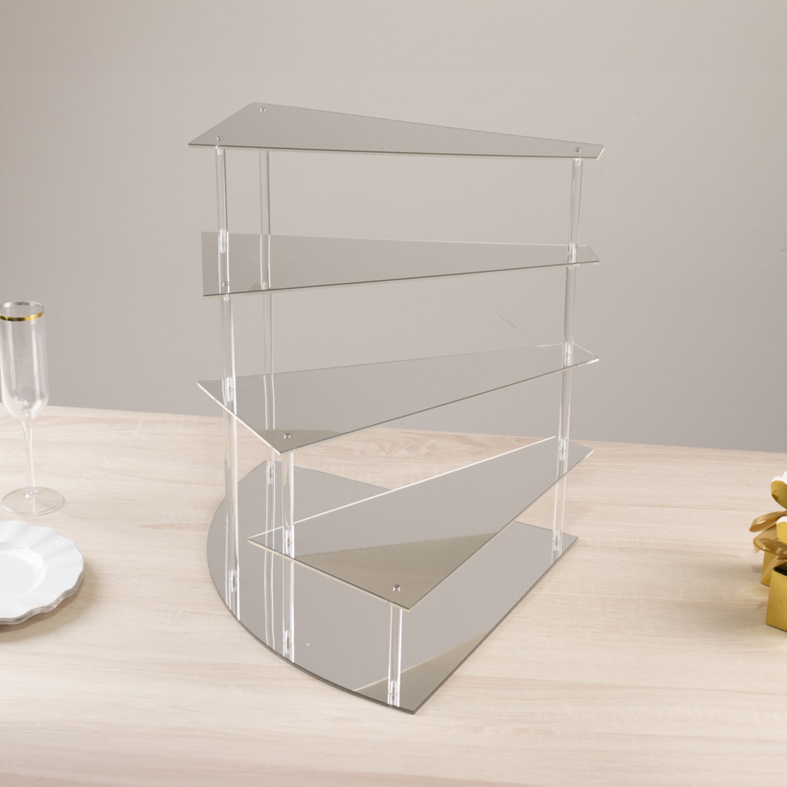 Silver spiral acrylic cupcake stand with mirror finish, 17" tall.