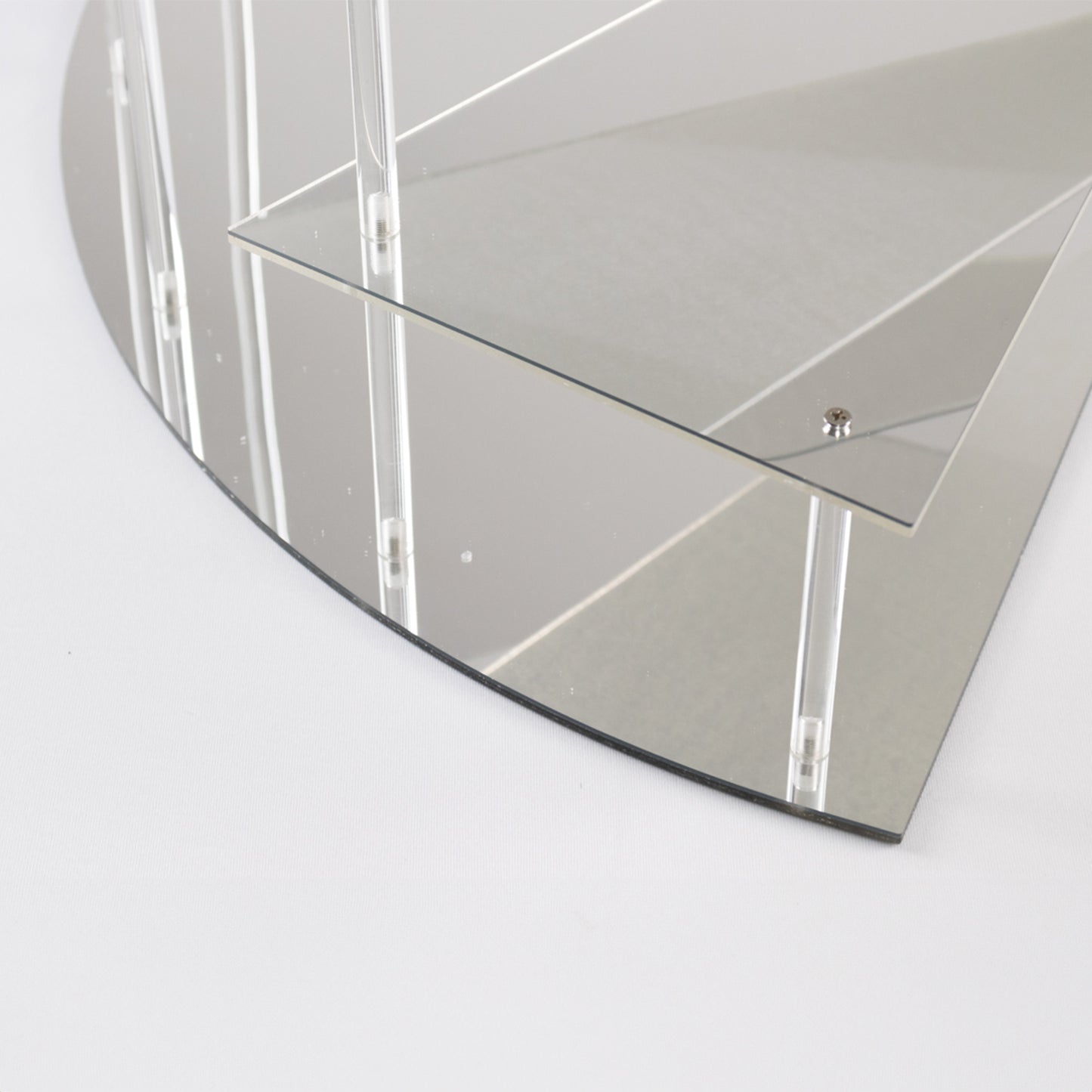 Silver spiral acrylic cupcake stand with mirror finish, 17" tall.