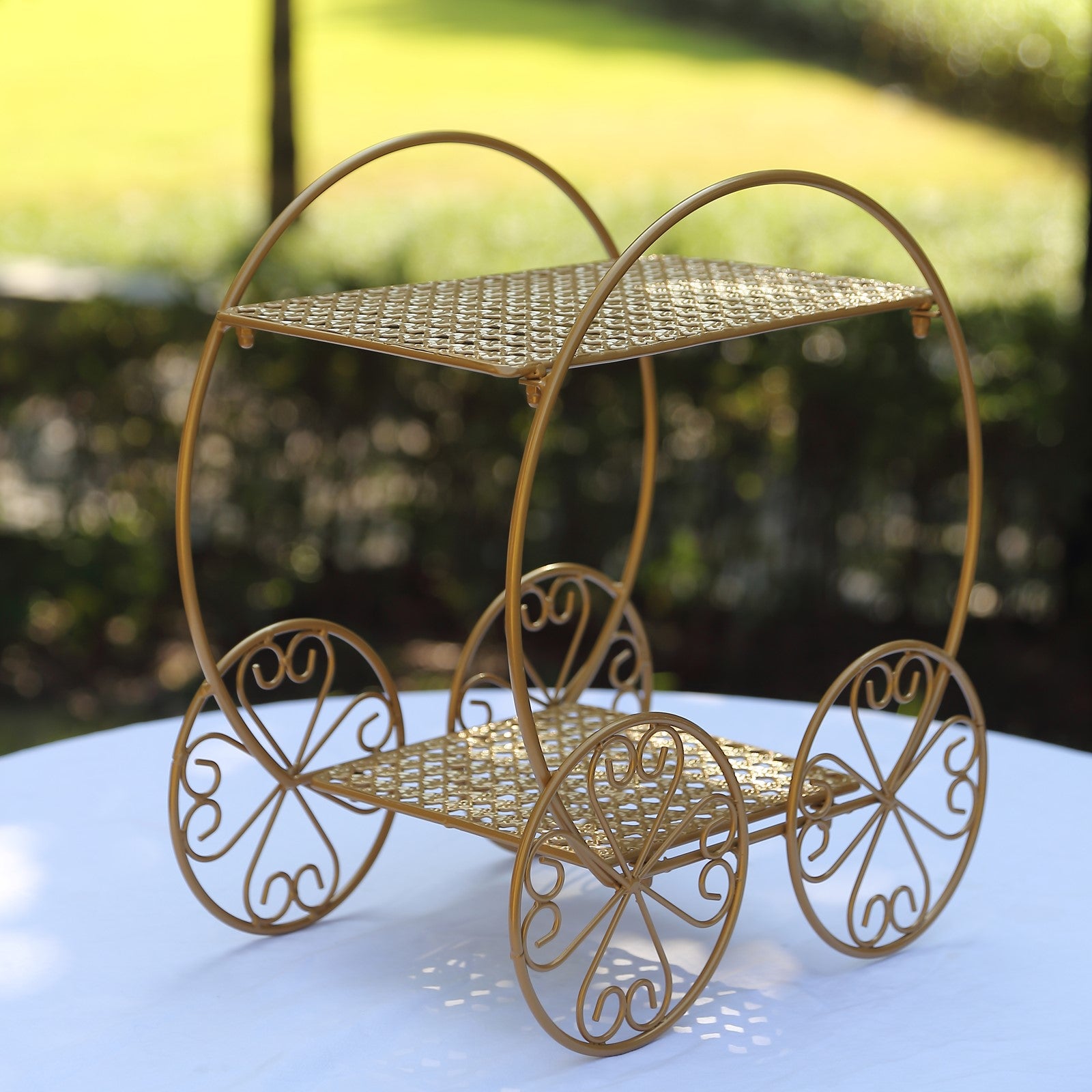 Gold metal Cinderella carriage cake stand, 14" tall, 2-tier design for weddings.