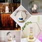 Gold hexagon metal floral hoop cake stand with wooden base, elegant dessert display.