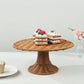 Natural rattan wicker pedestal cupcake stand with dessert display.