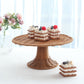 Natural rattan wicker cupcake stand with rustic desserts on display.