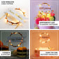 LED light up happy birthday banner cake topper in warm yellow tones.