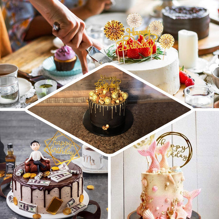 Gold and white birthday cake toppers with decorative fans and balloons.