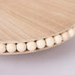 Natural rustic wooden cupcake stand with beaded edge, round dessert display tray.