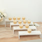 Whitewash wooden display risers set with cupcakes, rustic farmhouse style.