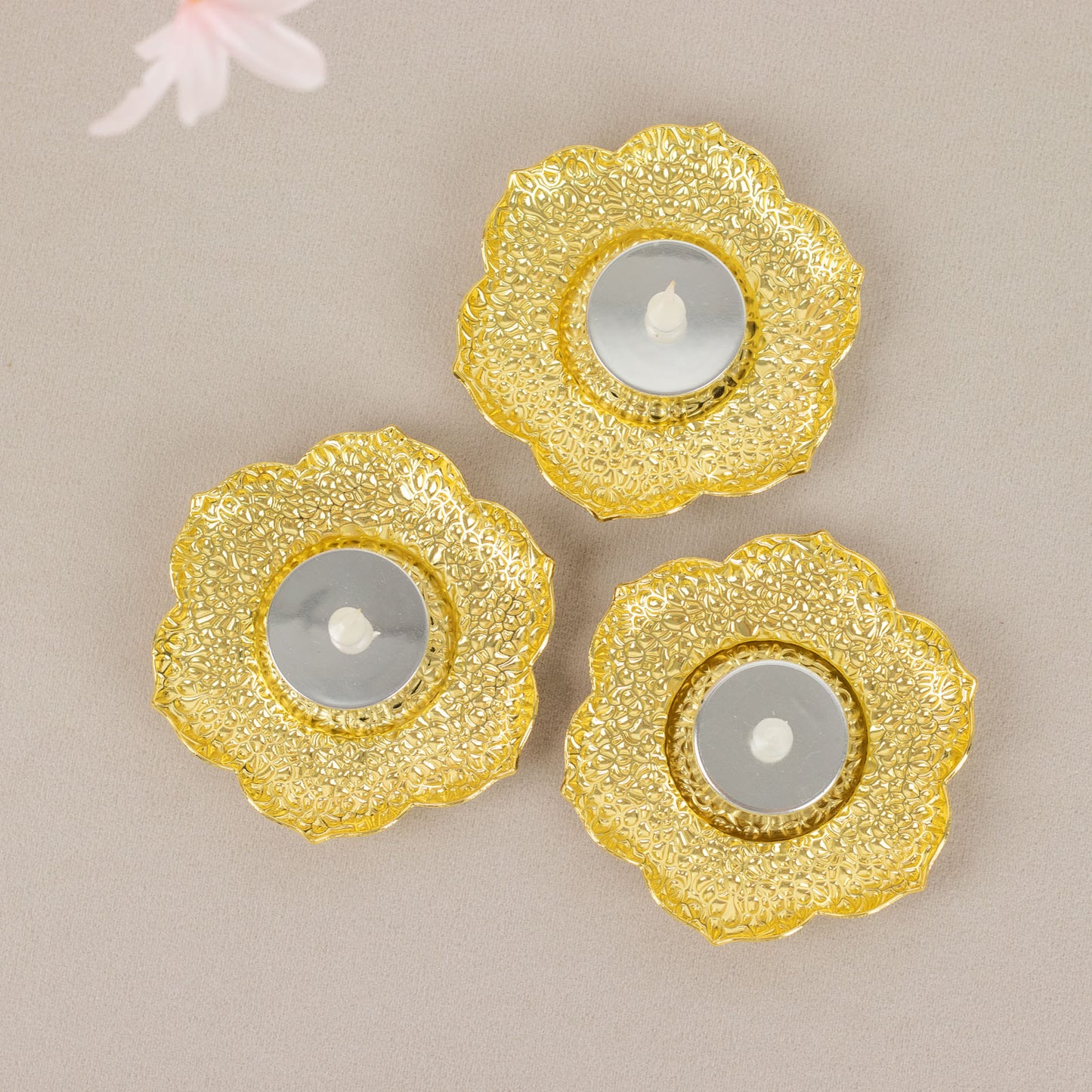 Shiny gold plum blossom tealight candle holders, vintage mini tea cup saucers.