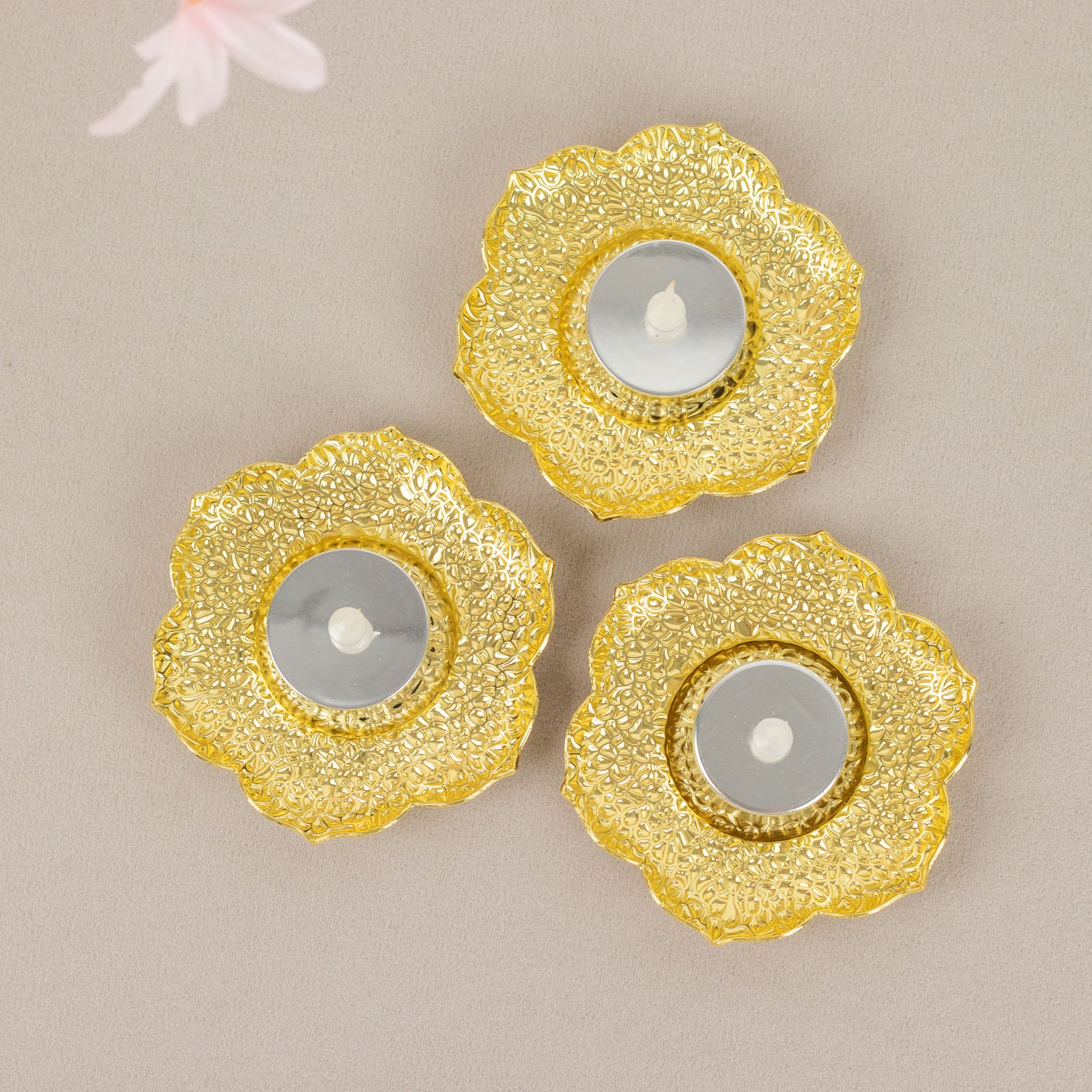 Shiny gold plum blossom tealight candle holders, vintage mini tea cup saucers.