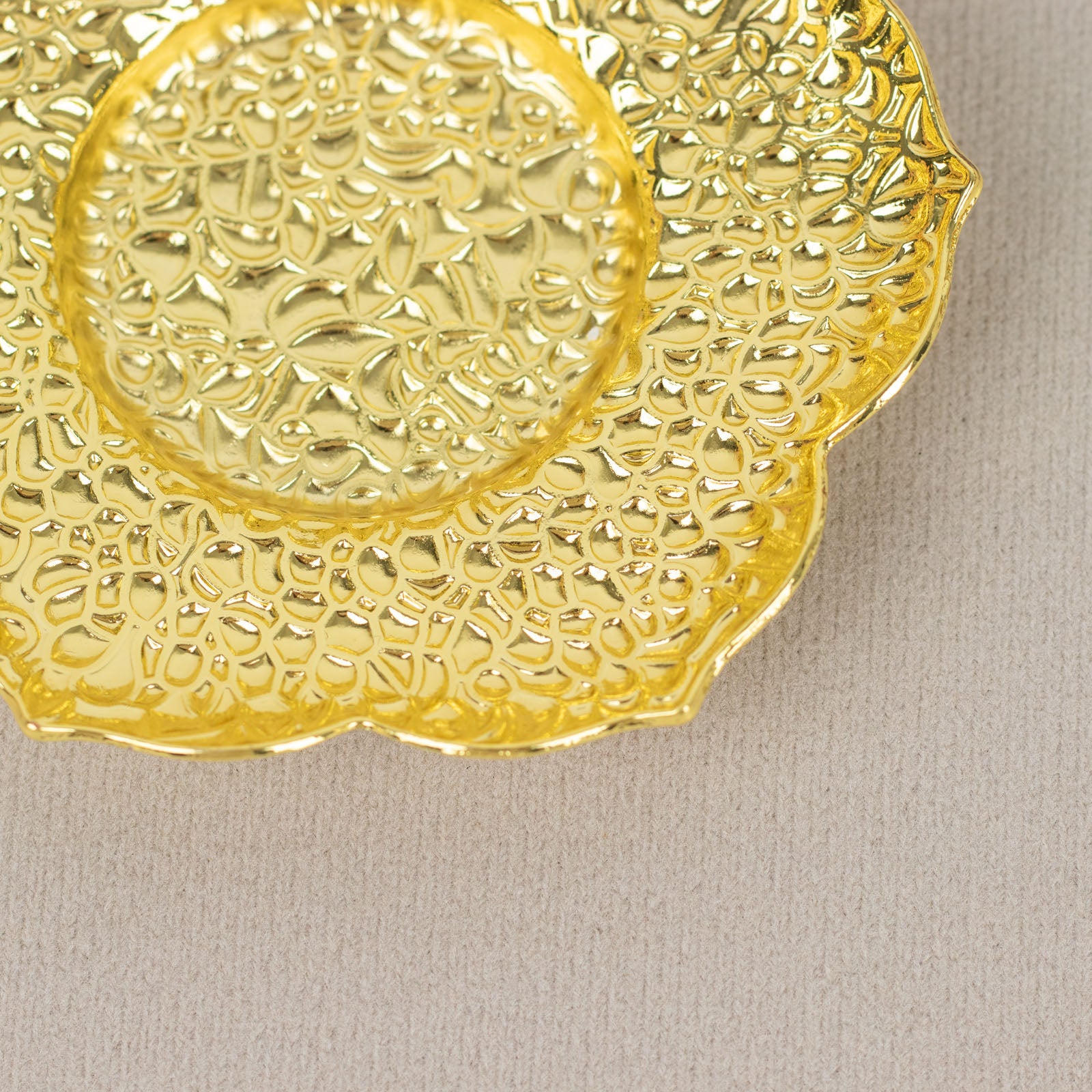 Shiny gold vintage mini tea cup saucer with plum blossom design.