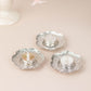 Shiny silver plum blossom tealight candle holders, vintage mini tea cup saucers.