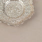 Shiny silver metal plum blossom tealight candle holder saucer.