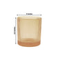Amber gold ribbed glass votive candle holder, 2.5 inches tall.