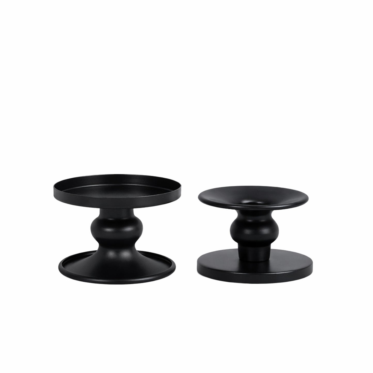 Black metal candle holders for pillar and taper candles.