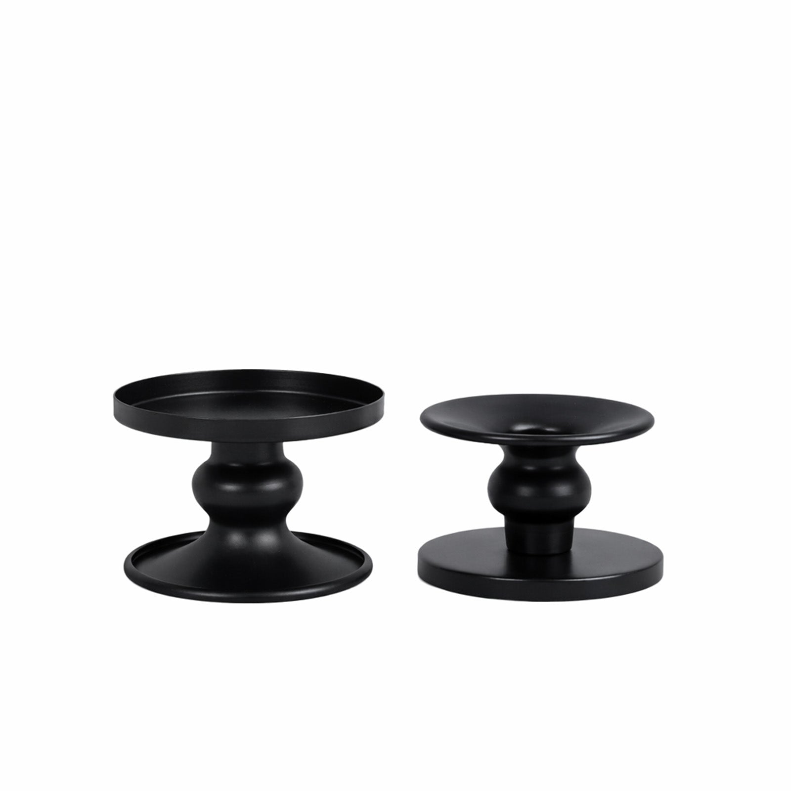 Black metal candle holders for pillar and taper candles.