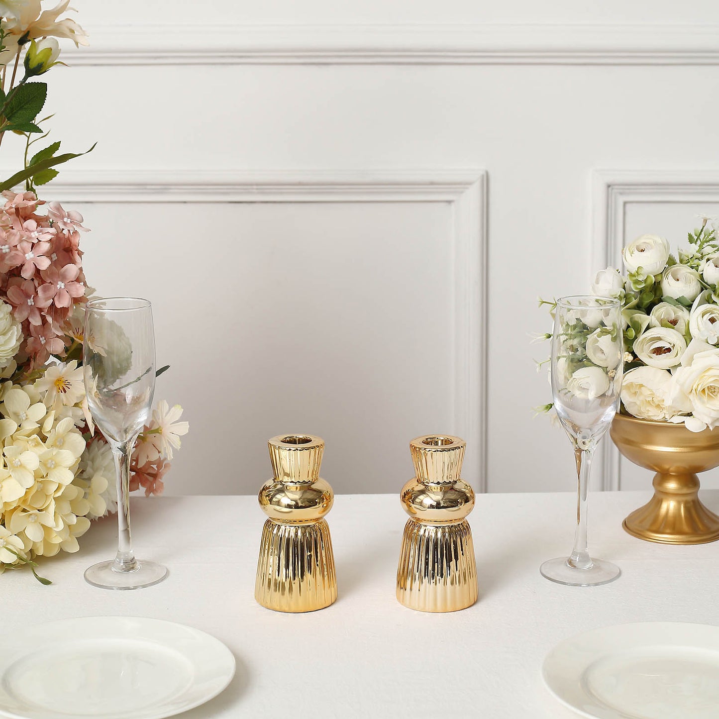 5" Metallic Gold Fluted Ball Neck Ceramic Taper Candle Holders on a table.