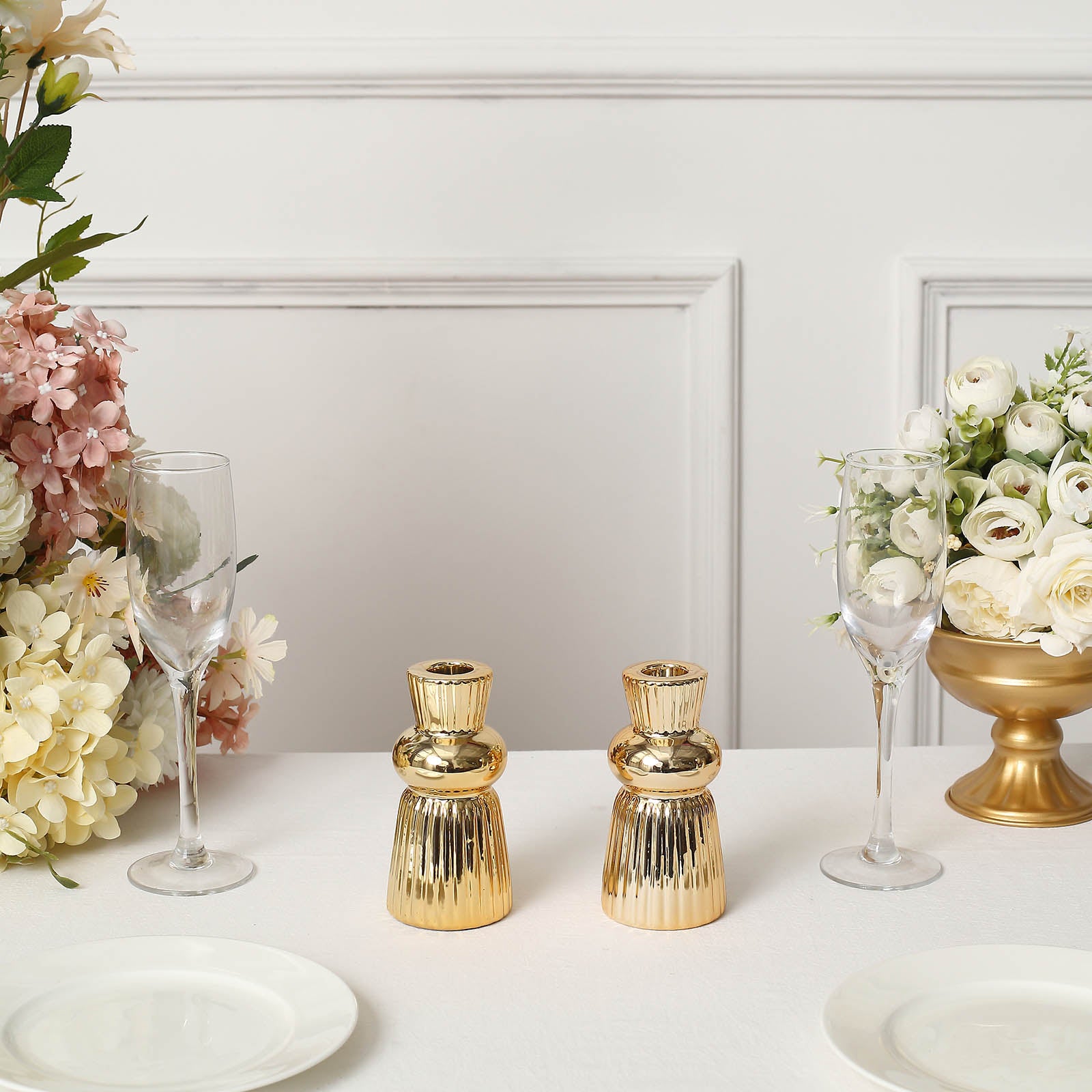 5" Metallic Gold Fluted Ball Neck Ceramic Taper Candle Holders on a table.