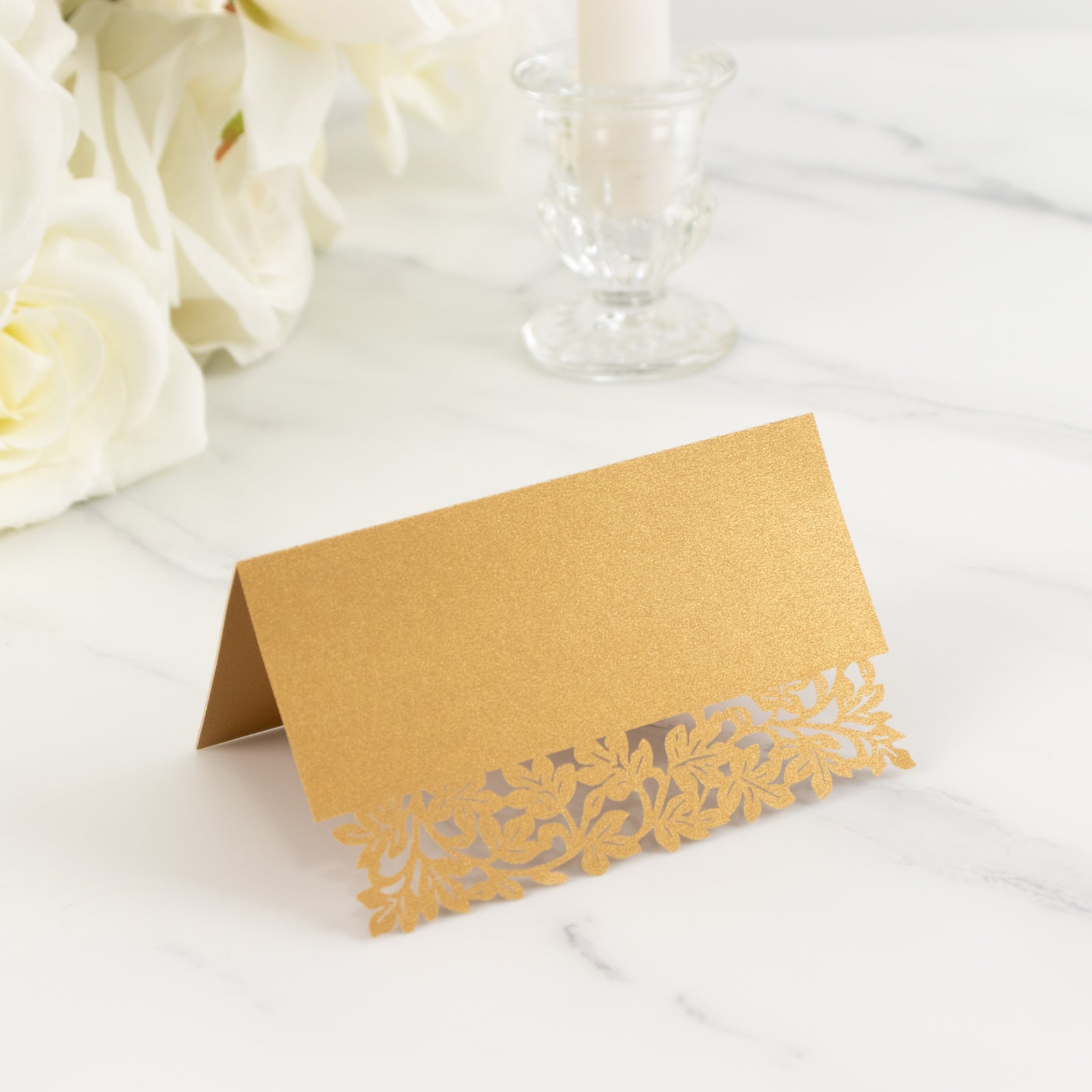 Gold wedding table number card with laser cut leaf vine design. #whtbkgd