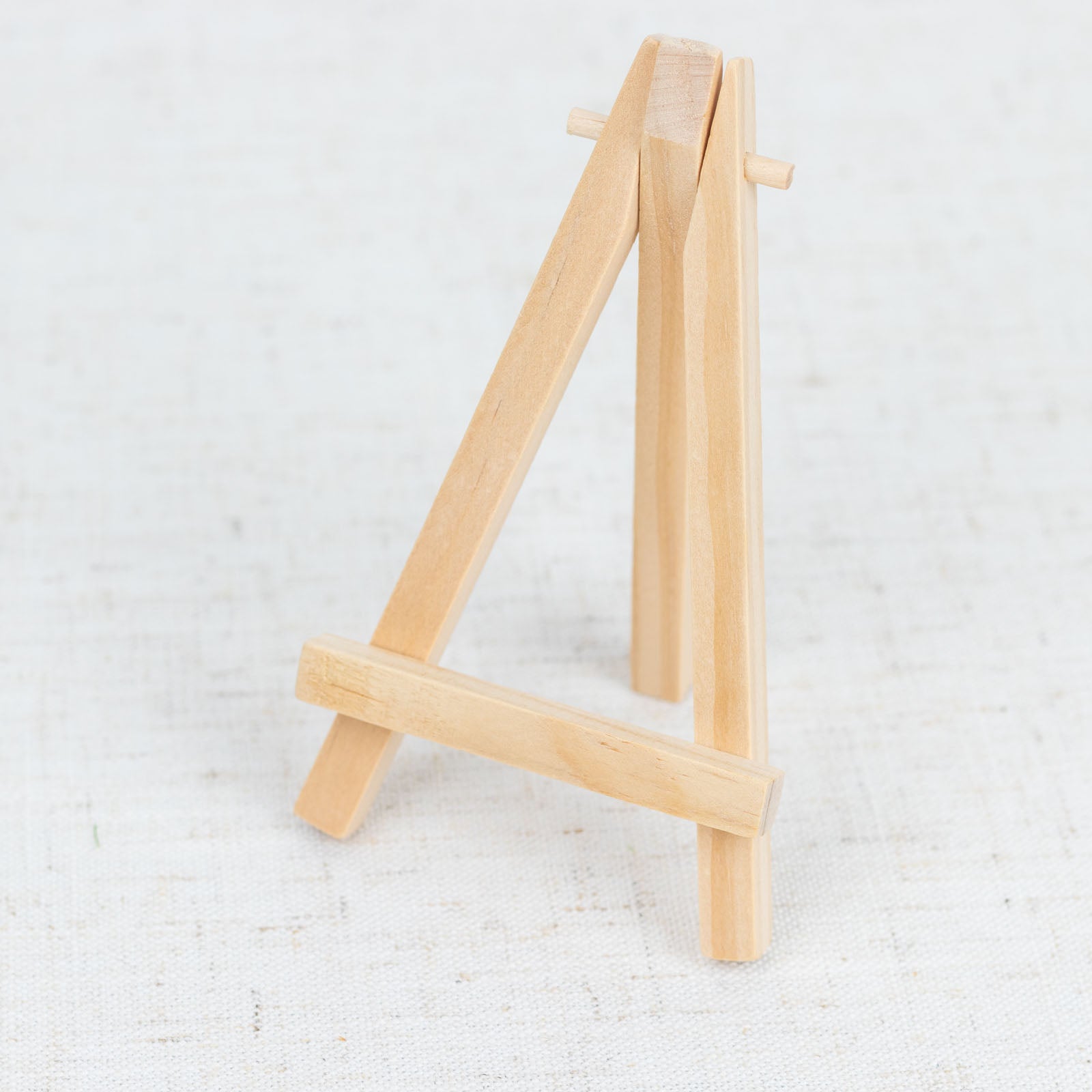 Natural mini rustic wooden tabletop easel stand for place cards.