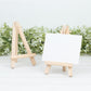 Natural mini rustic wooden tabletop easel stands for place cards.