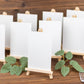 Natural small rustic wooden tabletop easel stands for place cards.