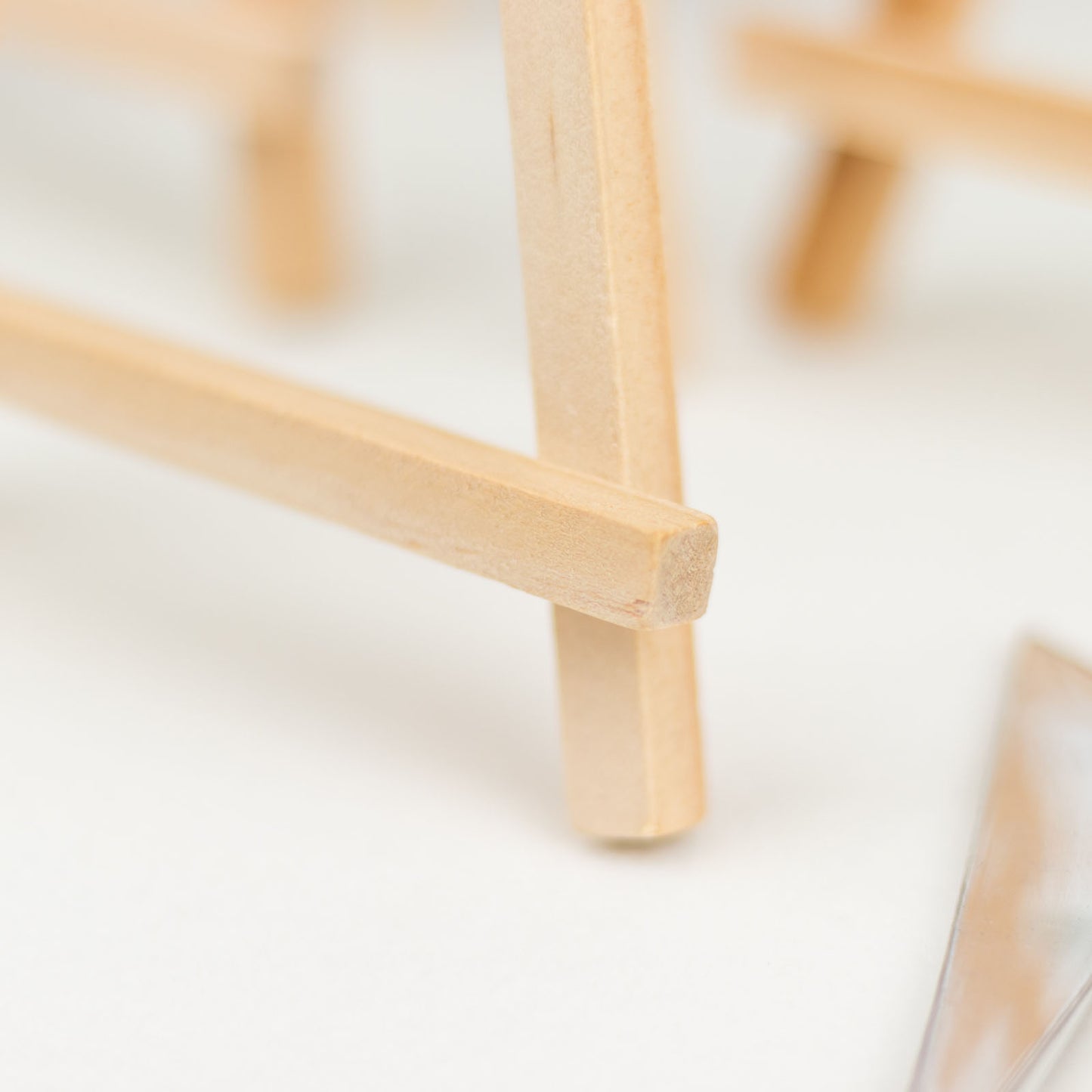 Natural small rustic wooden place card holders.