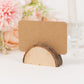 Natural wooden semicircle place card holder with brown paper card.