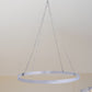 Stainless steel hanging hoop for ceiling drapes, perfect for white decor.