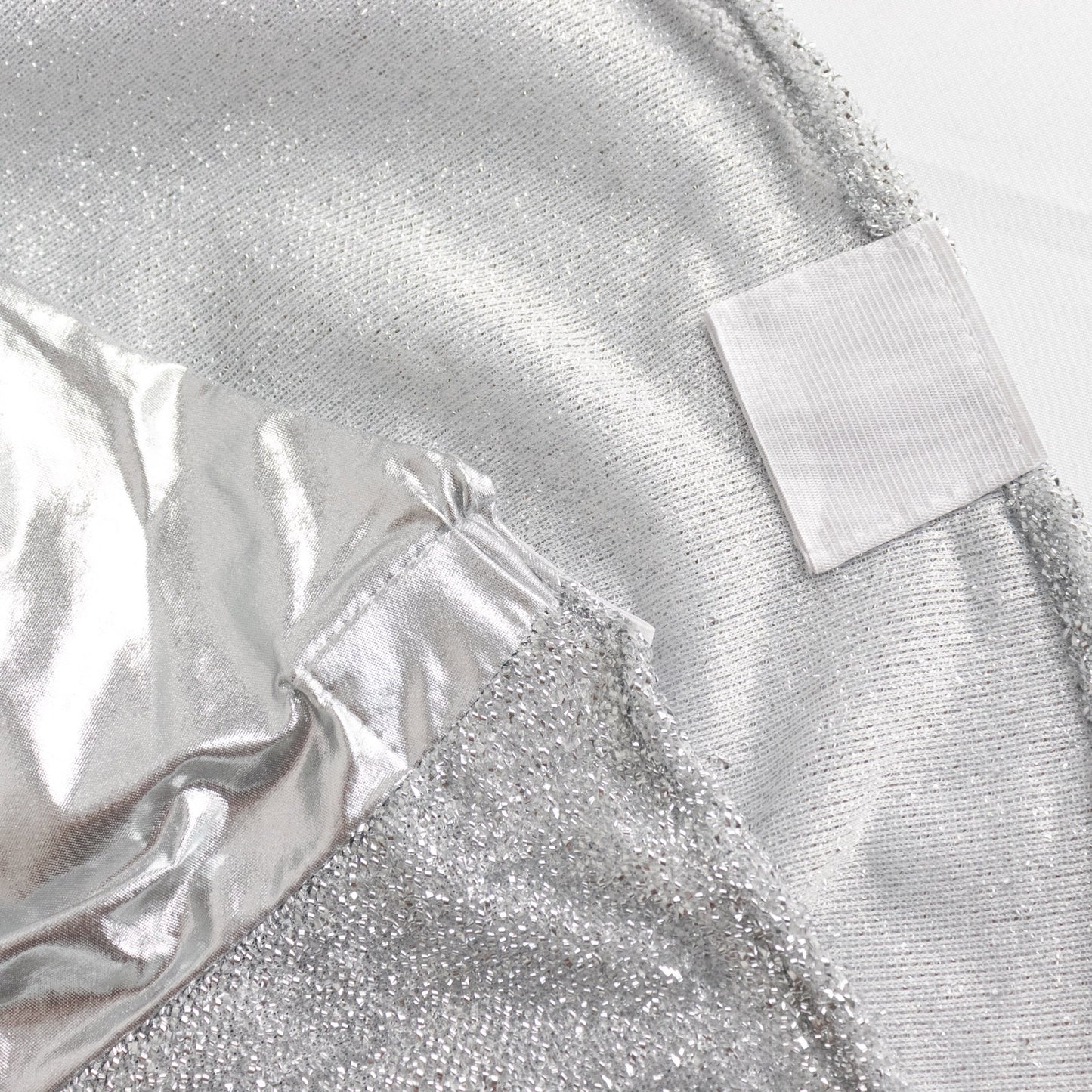 Metallic silver shimmer tinsel spandex banquet chair cover with attached sash.