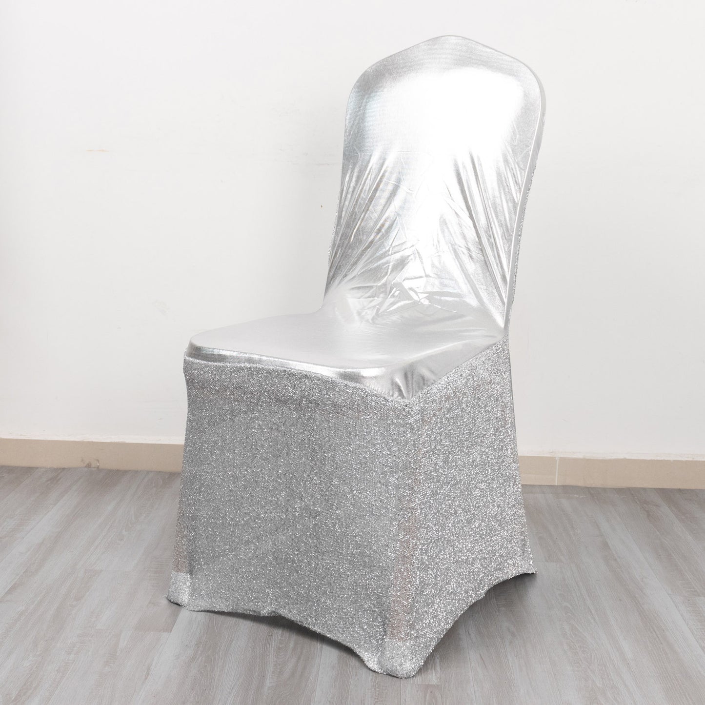 Metallic silver shimmer tinsel spandex banquet chair cover with attached sash.