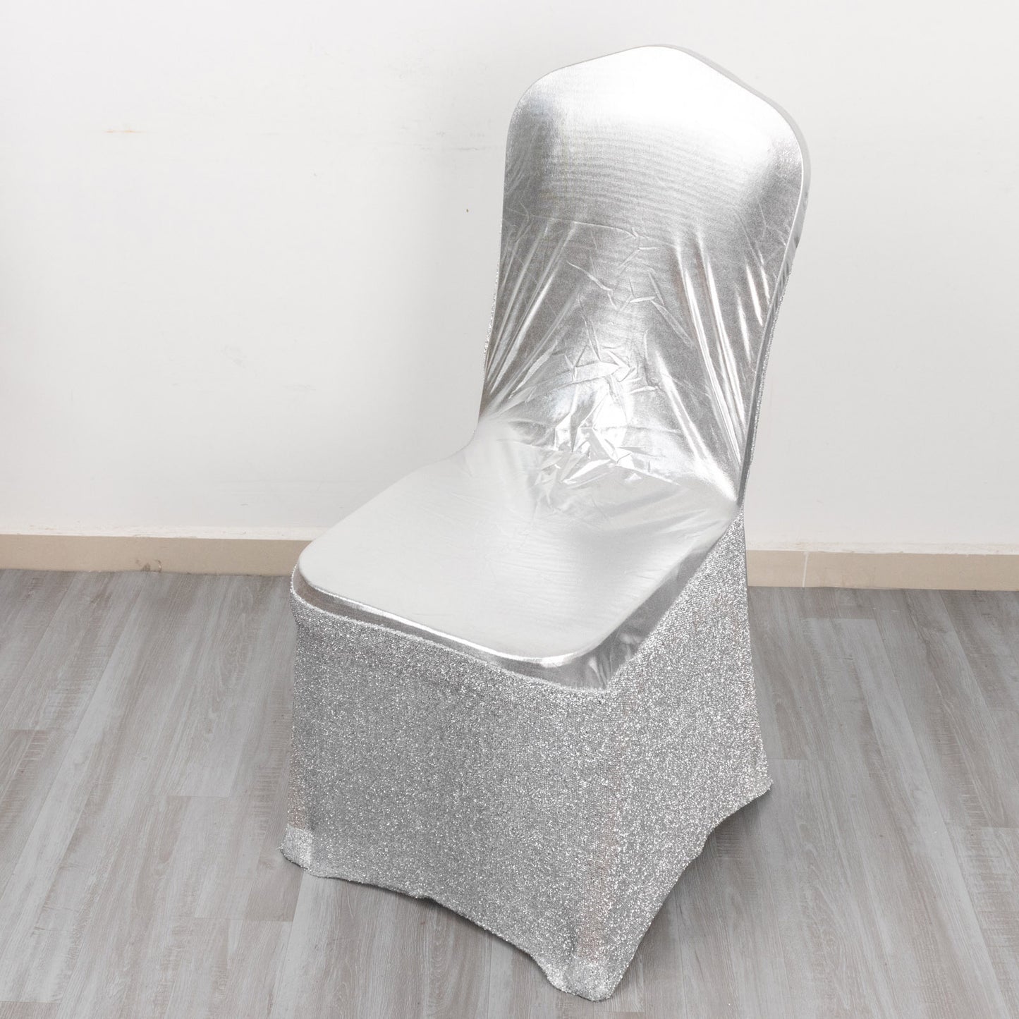 Metallic silver shimmer tinsel spandex banquet chair cover with attached sash.