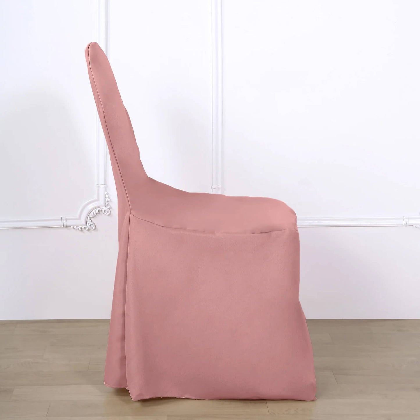 Dusty rose polyester folding chair cover, reusable and stain resistant.