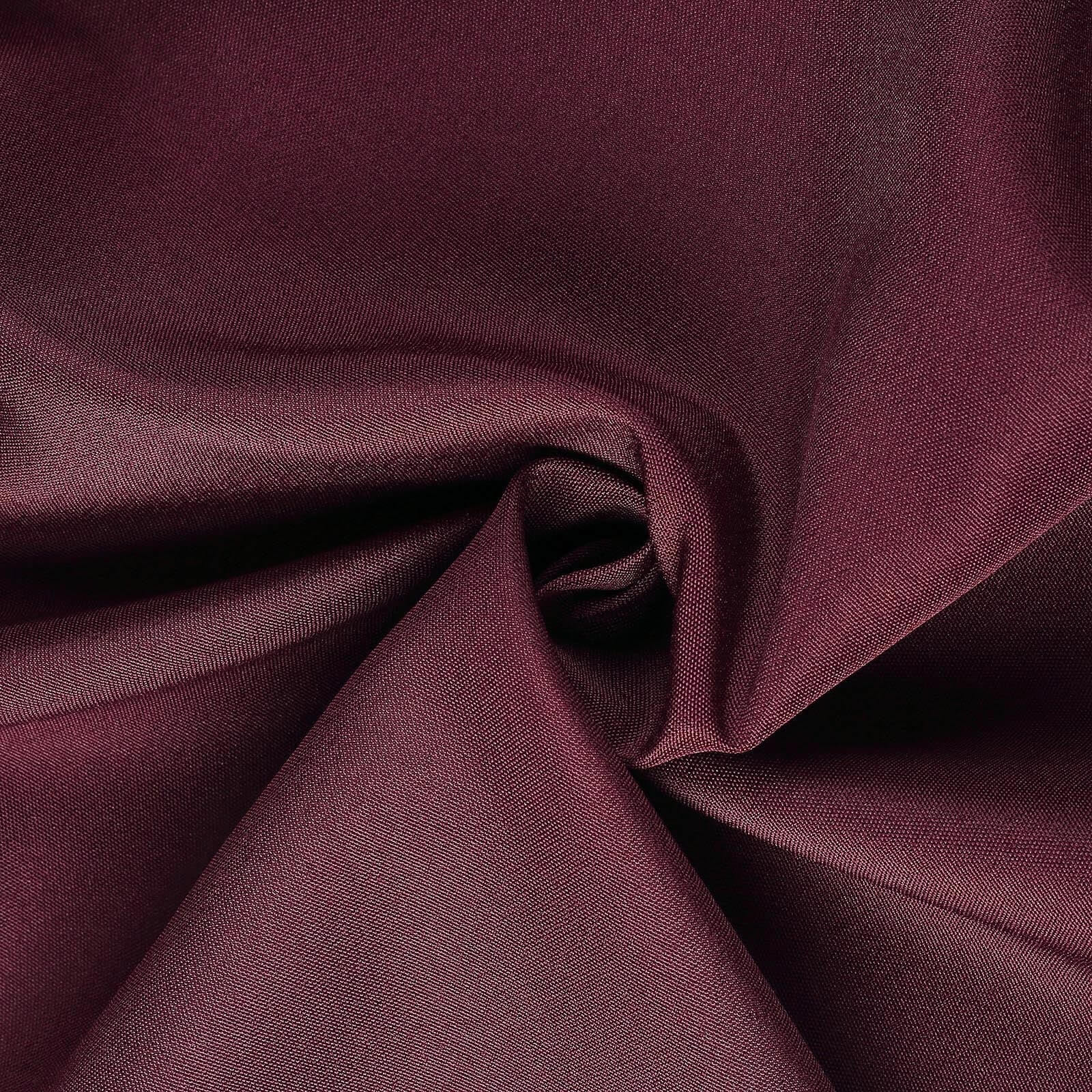 Burgundy polyester folding chair cover fabric close-up.