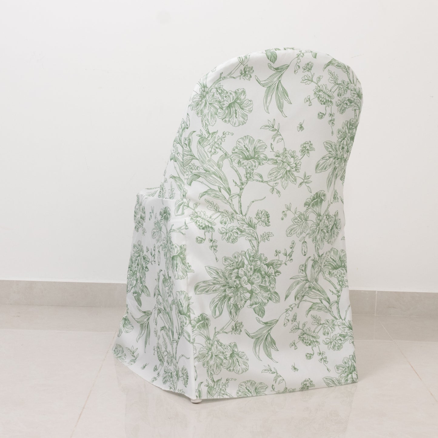 White and dusty sage green chair cover with French toile pattern for folding chairs.