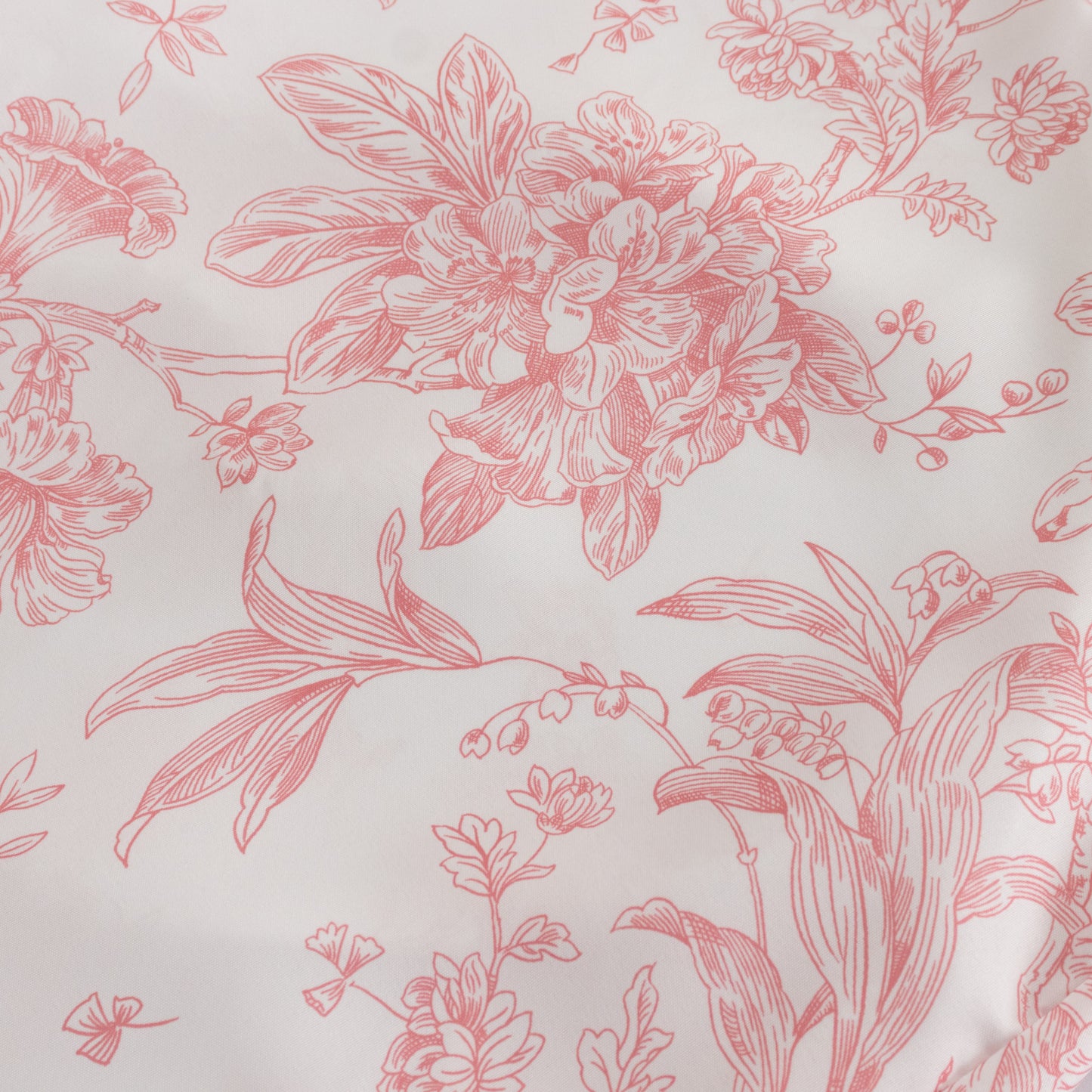 White pink French toile patterned chair cover.