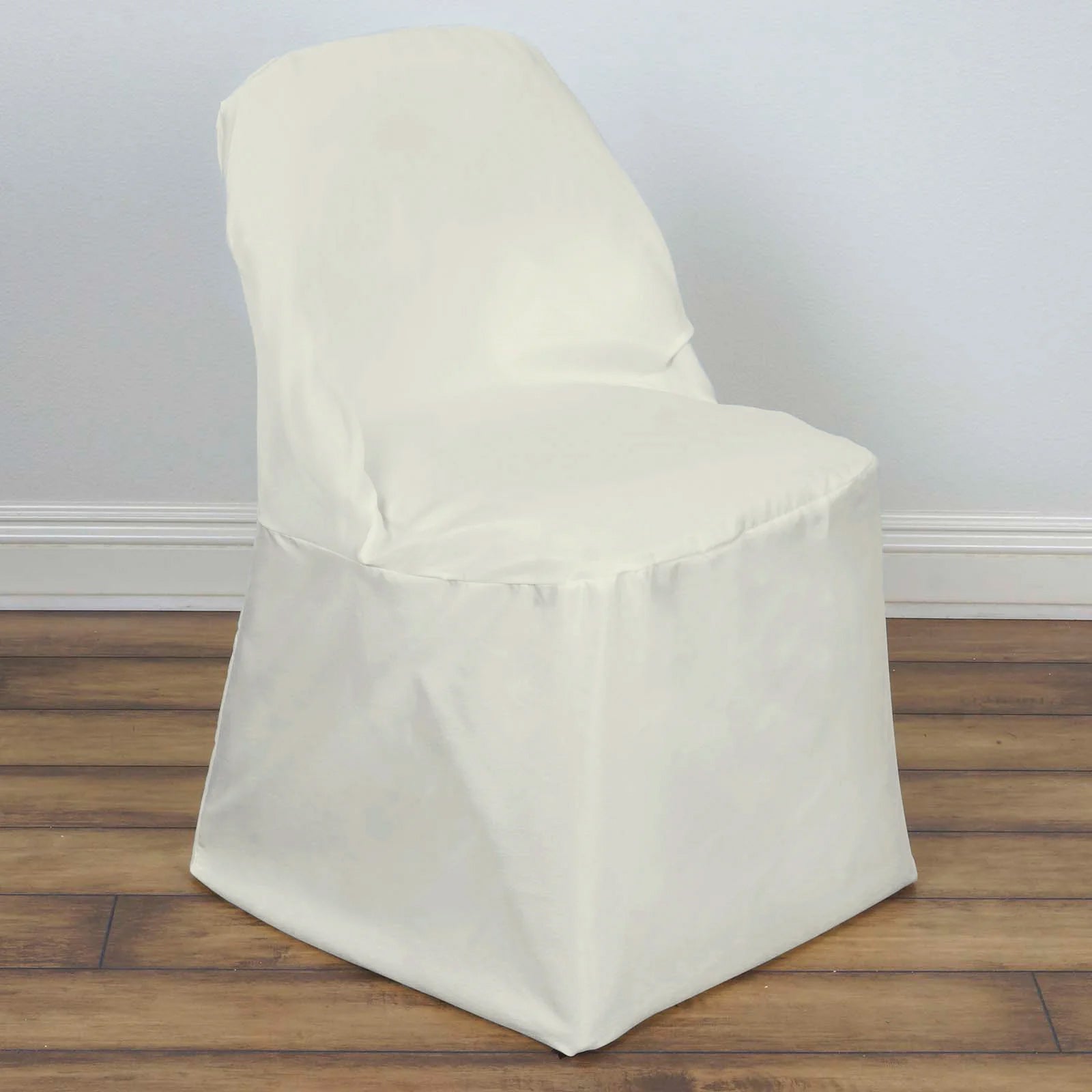 Ivory polyester folding chair cover, reusable and stain resistant.