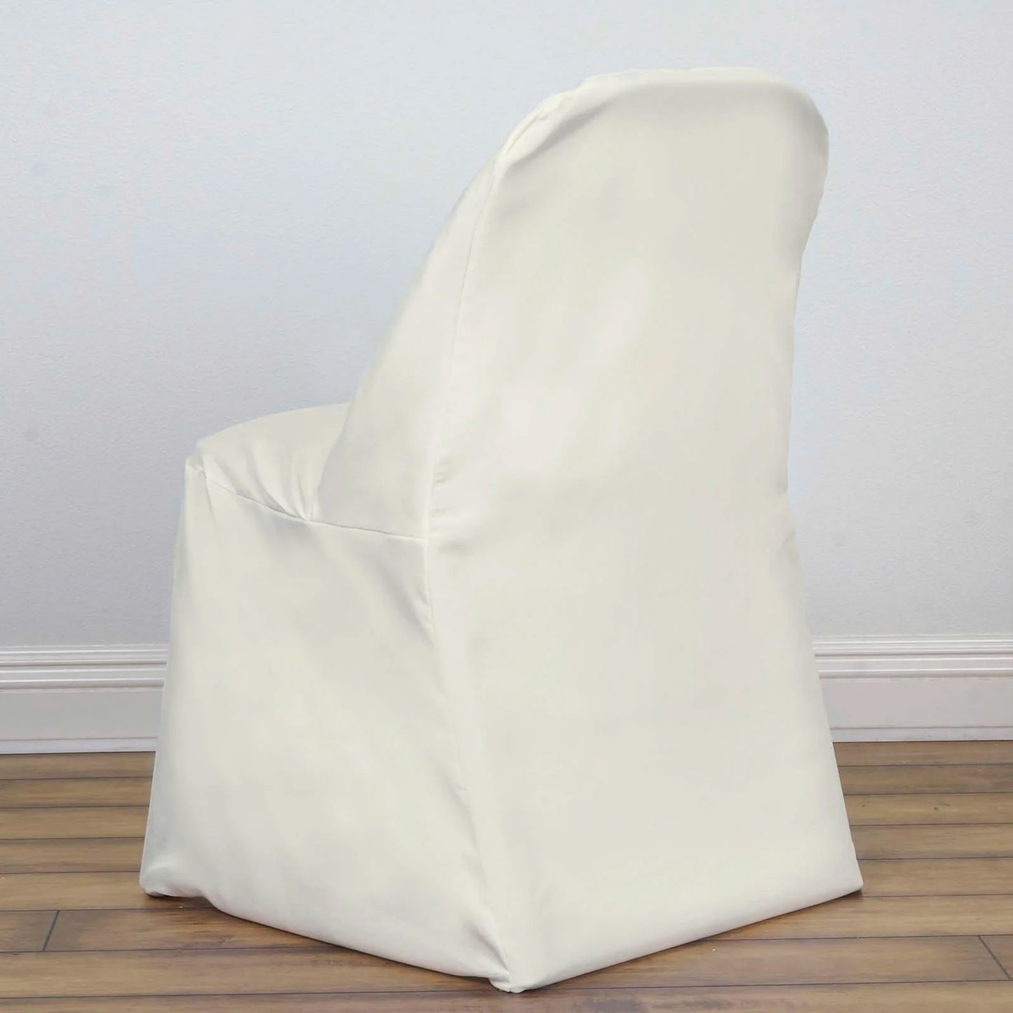 Ivory polyester folding chair cover, reusable and stain resistant.