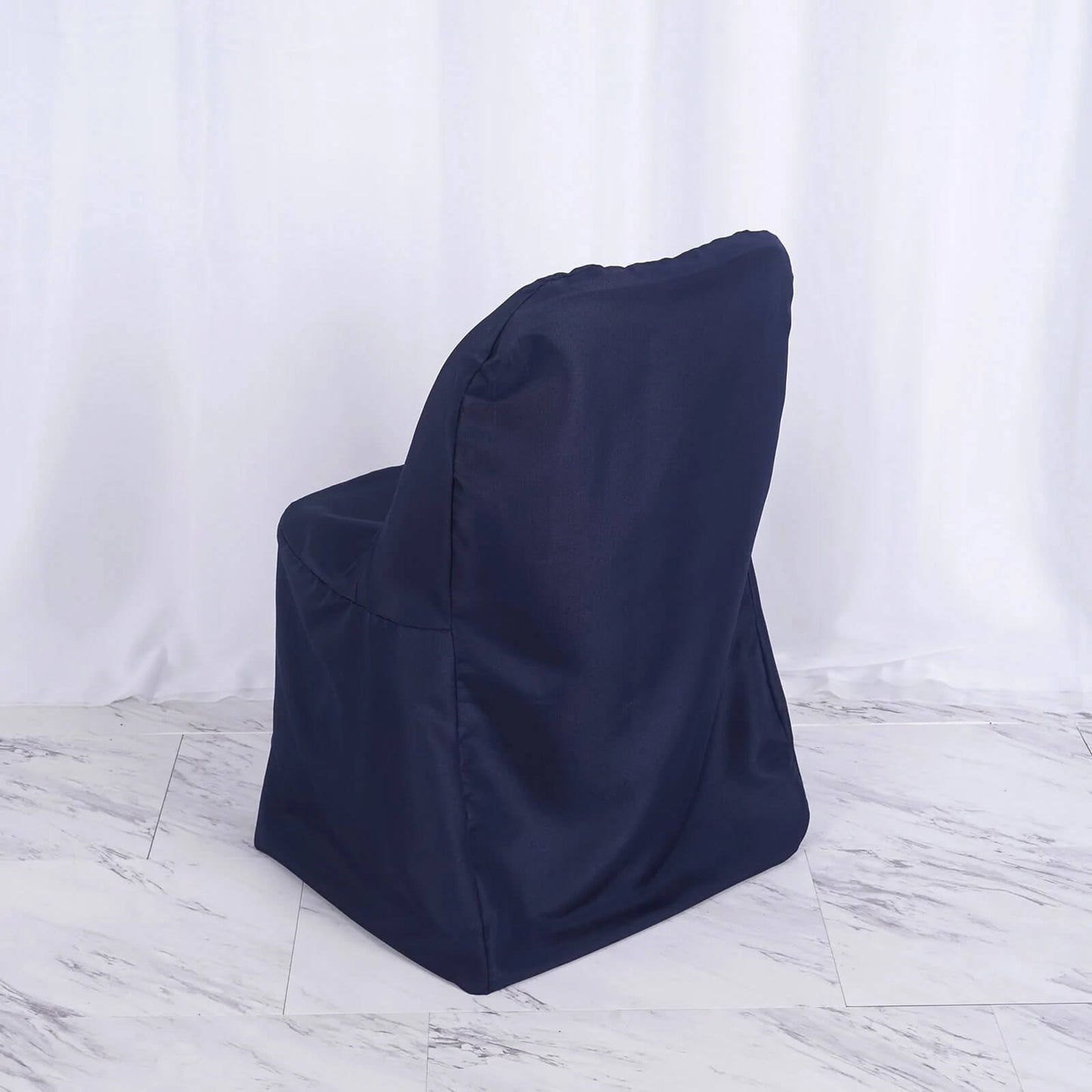 Navy blue folding chair cover, reusable and stain resistant.