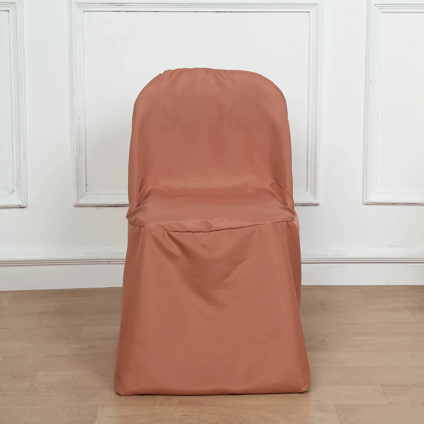 Terracotta polyester folding chair cover, reusable and stain resistant.