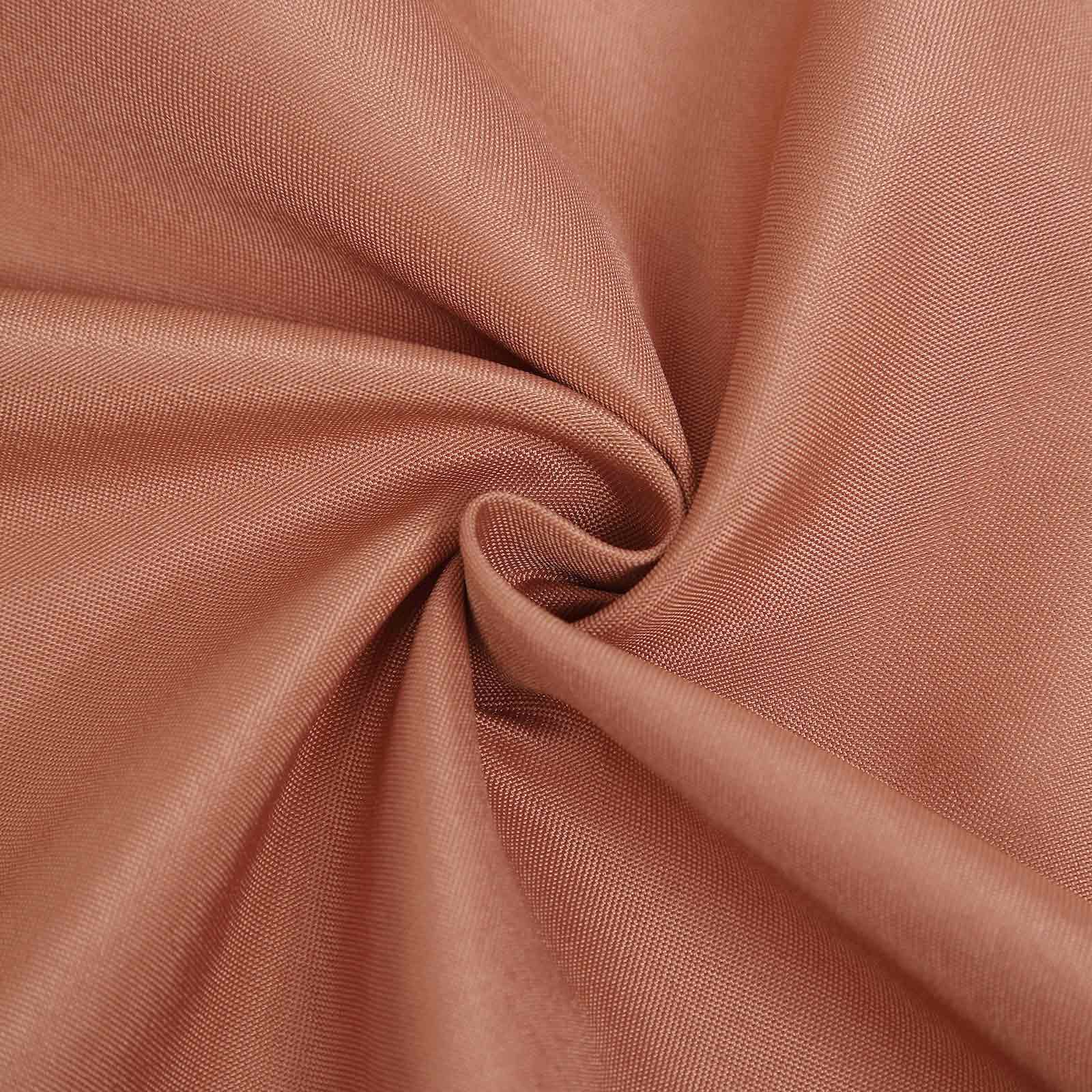 Terracotta polyester fabric for reusable chair covers.