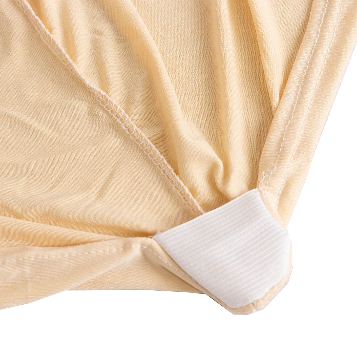 Beige spandex chair cover with silver rhinestone sash band.