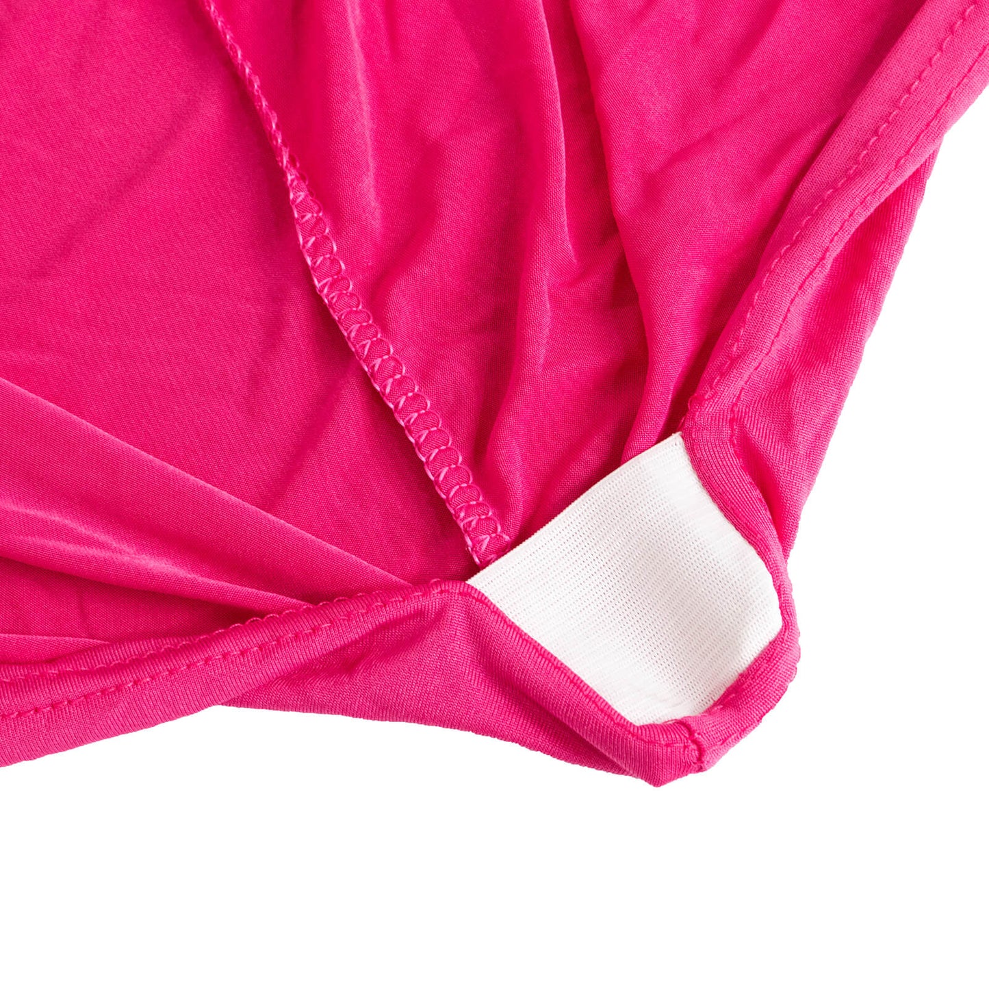 Fuchsia spandex chair cover with silver rhinestone sash detail.