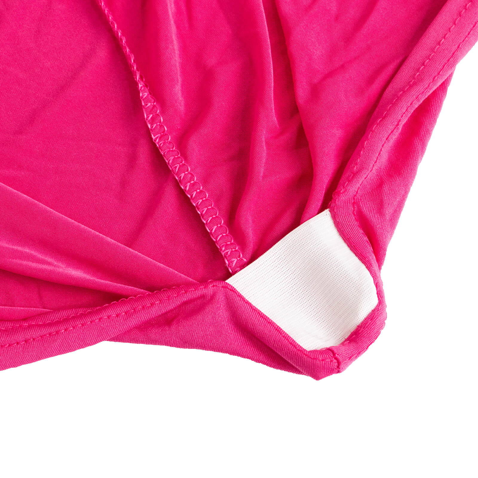 Fuchsia spandex chair cover with silver rhinestone sash detail.