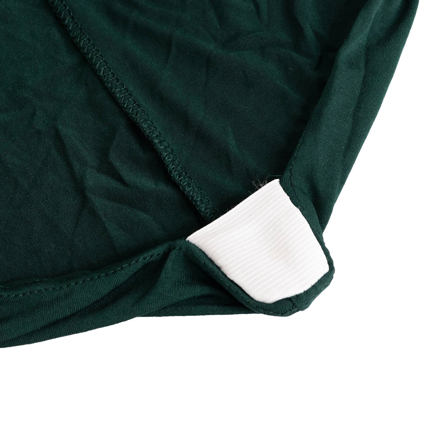 Emerald green spandex chair cover with silver rhinestone sash.