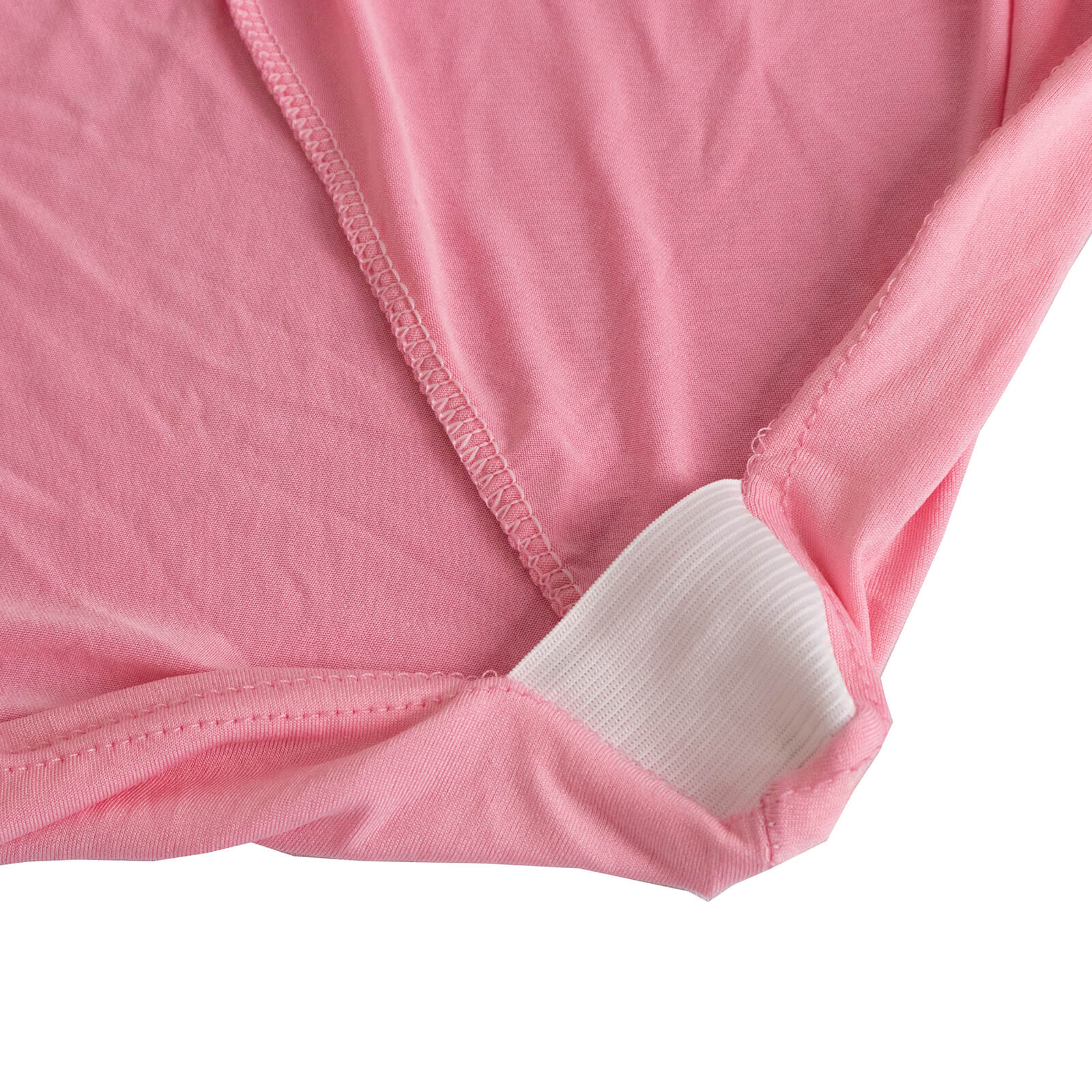 Pink spandex folding chair cover with rhinestone sash.