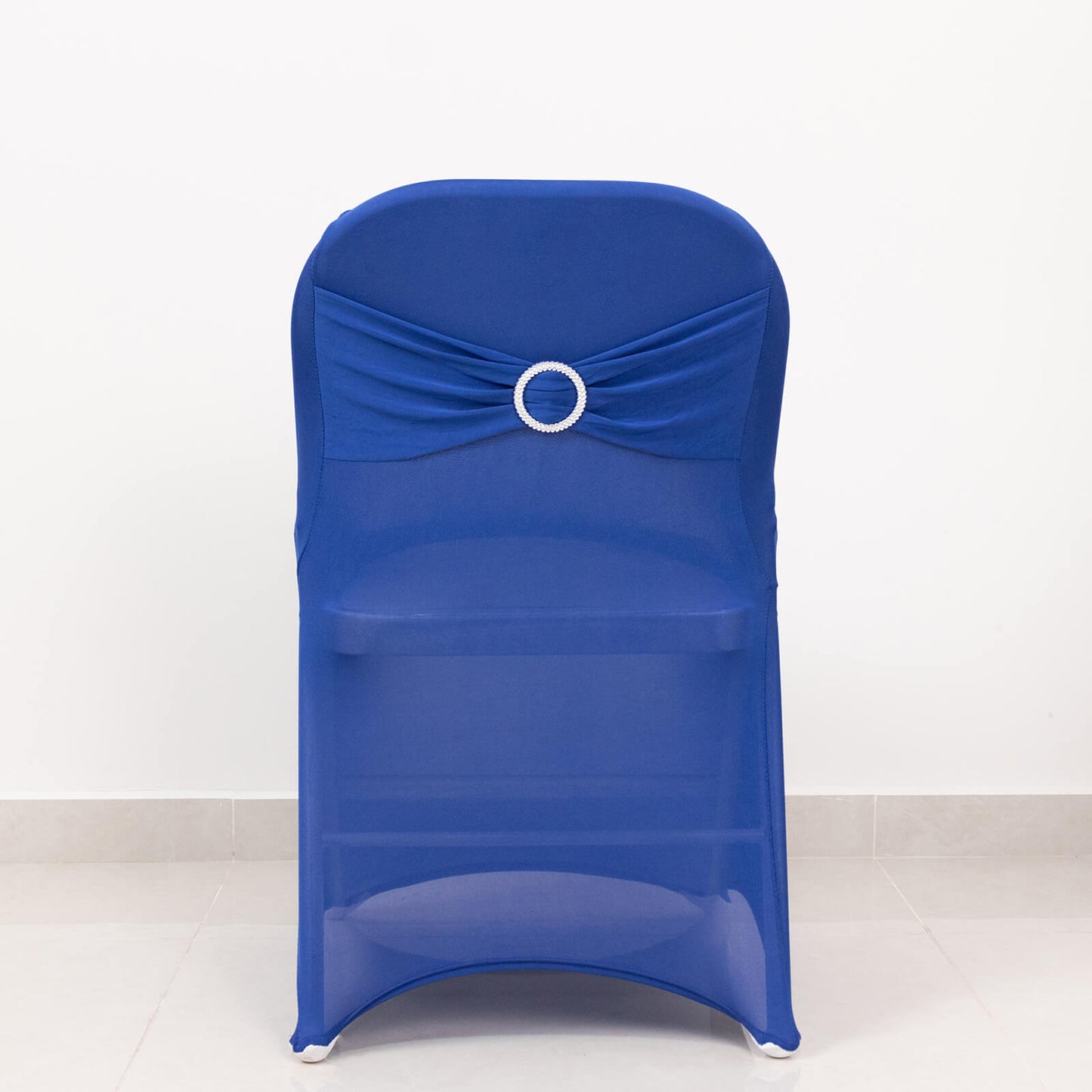 Royal blue spandex folding chair cover with silver rhinestone sash.
