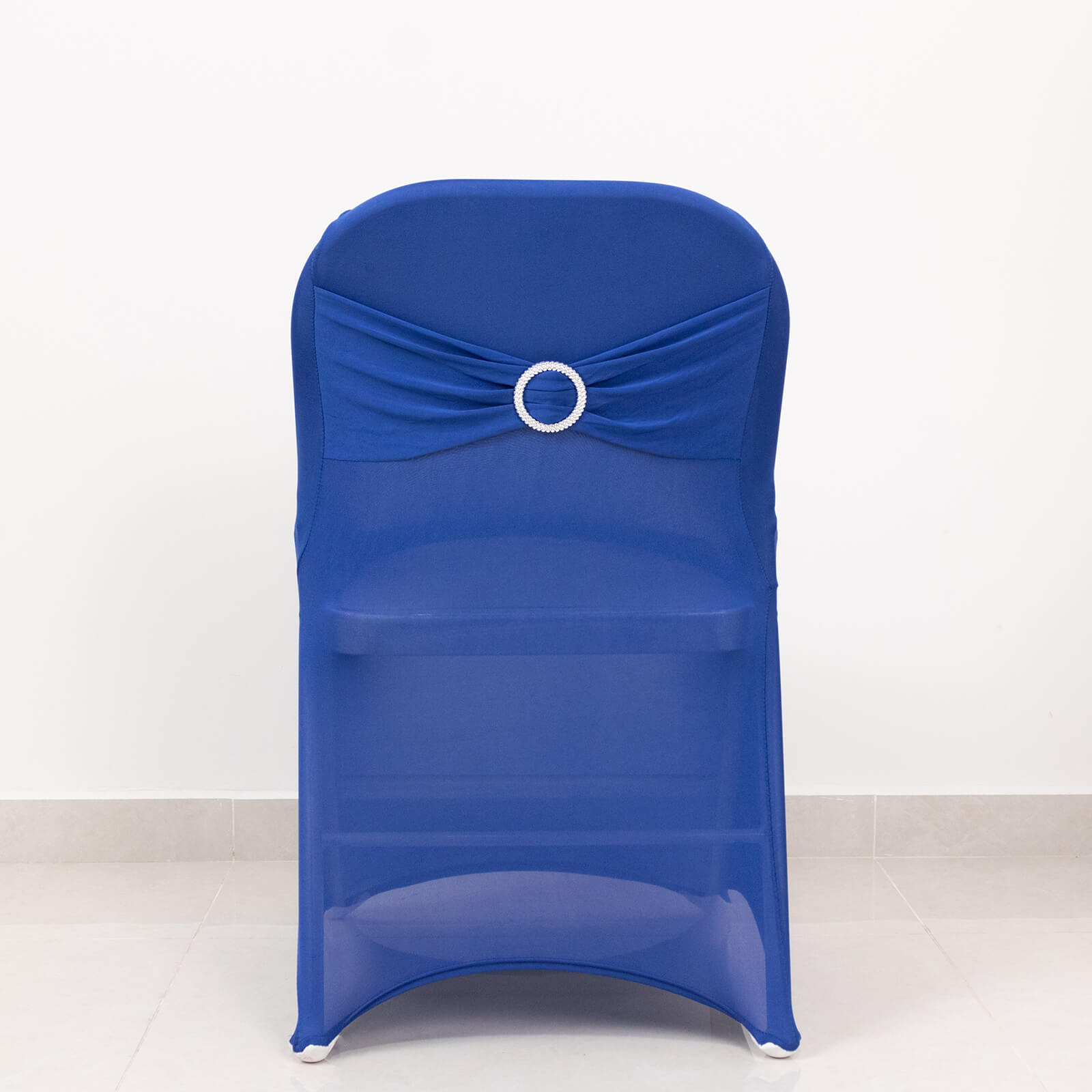 Royal blue spandex folding chair cover with silver rhinestone sash.